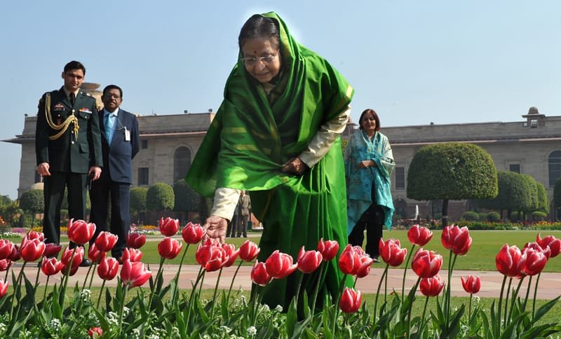 The President, Smt. Pratibha Devisingh Patil poses with the flower ‘Tulips’ at the annual…