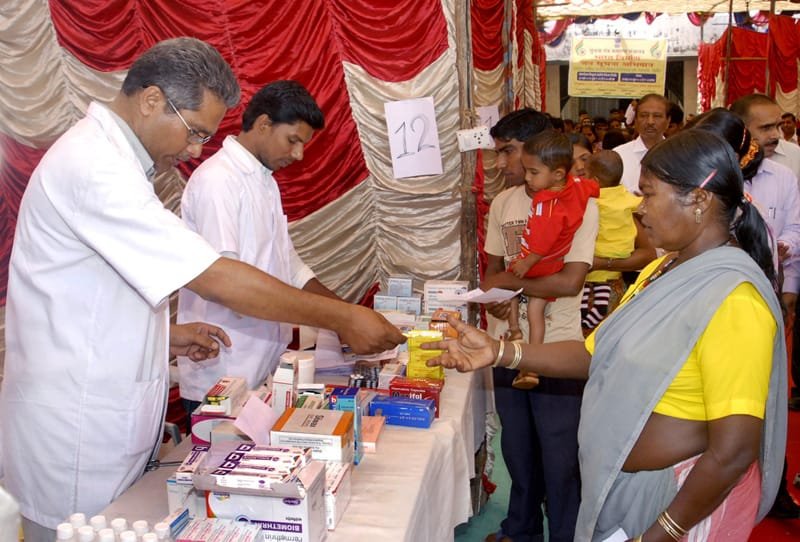 Free medicine being distributed at the medical checkup camp, under..