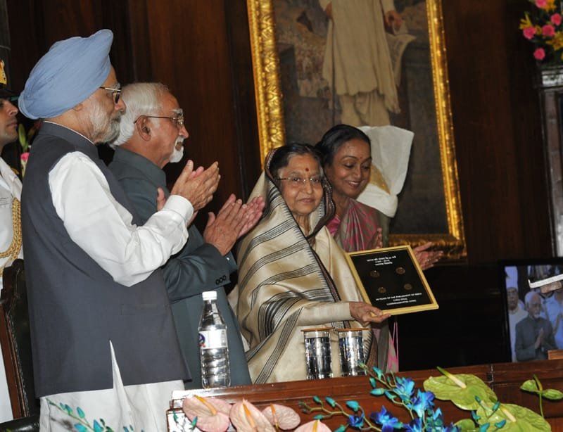 The President, Smt. Pratibha Devisingh Patil releasing the coins…