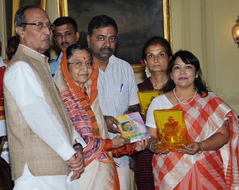 The President, Smt. Pratibha Devisingh Patil receiving the book…