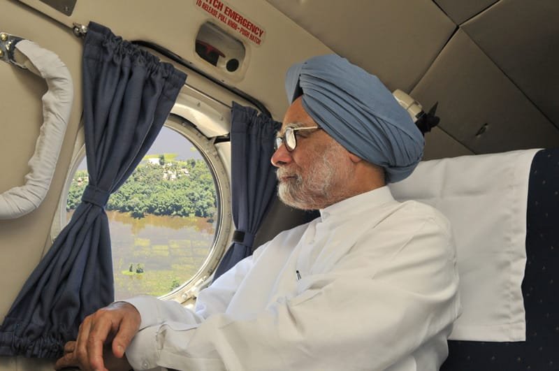 The Prime Minister, Dr. Manmohan Singh making an aerial survey of flood…