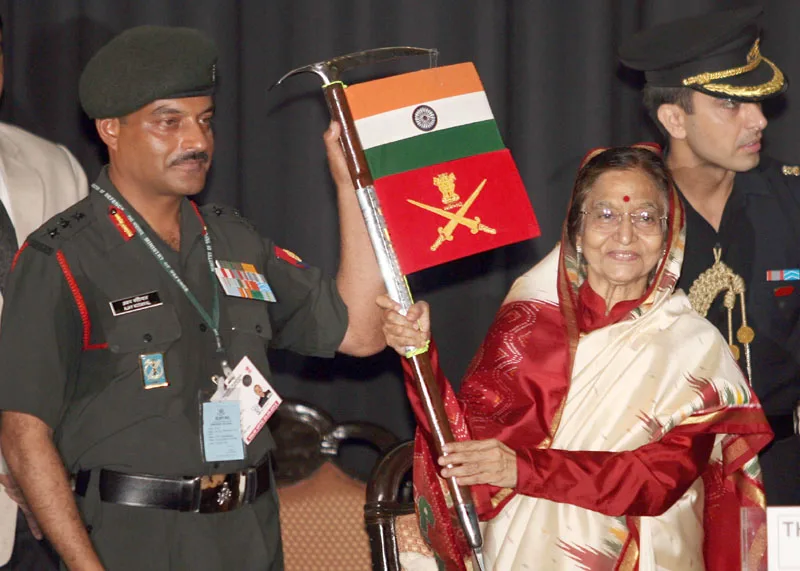 The President, Smt. Pratibha Devisingh Patil receiving the flags from…