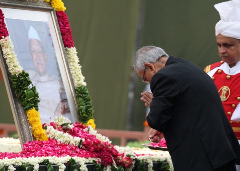 The President, Shri Pranab Mukherjee paying homage at the Samadhi of...