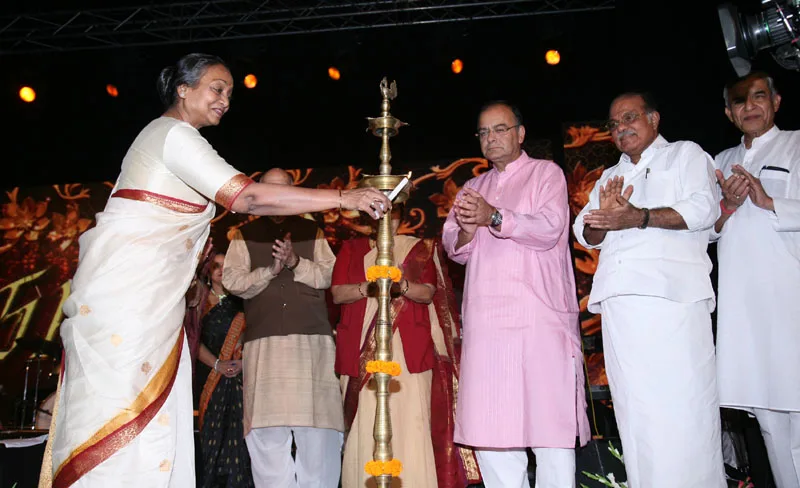 The Speaker, Lok Sabha, Smt. Meira Kumar lighting the lamp at a musical…
