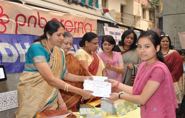 PNB Prerna distributes dictionary to the under priviledged childrens of Adharshila