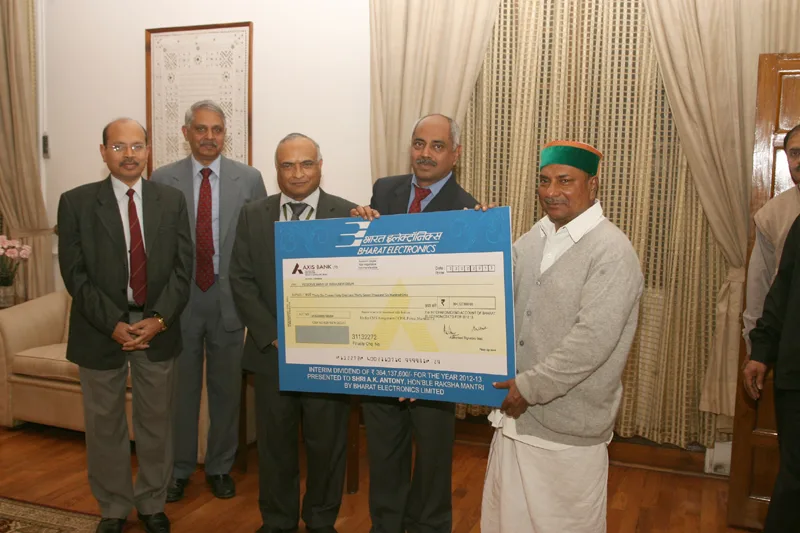 The CMD, BEL, Shri Anil Kumar presenting a interim dividend cheque to…