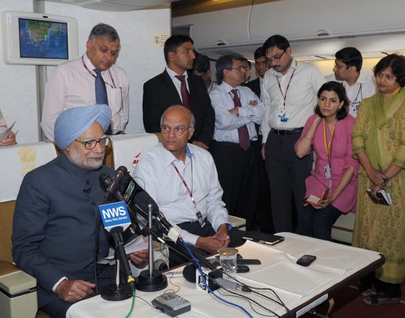 The Prime Minister, Dr. Manmohan Singh briefing the accompanying media on board flight…