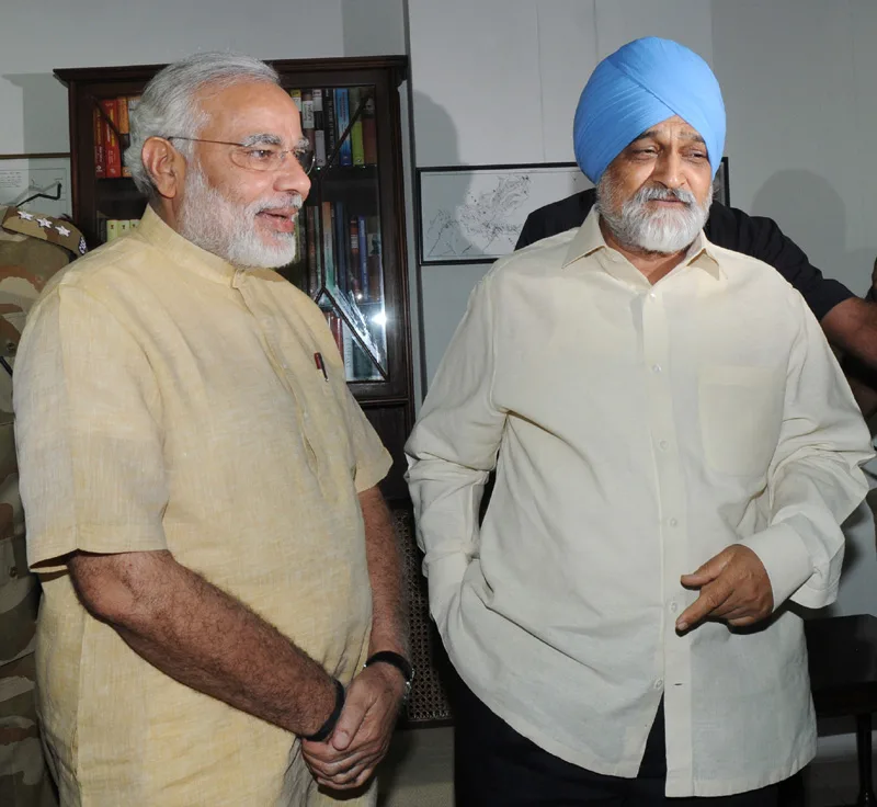 The Chief Minister of Gujarat, Shri Narendra Modi meeting the Deputy Chairman, Planning Co…