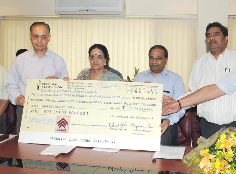 The Chairman & Managing Director, HUDCO, Shri V.P. Baligar presenting the…