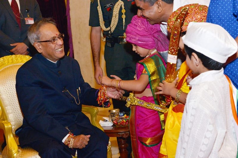 Children tying ‘Rakhi’ to the President, Shri Pranab Mukherjee, on the occasion of…