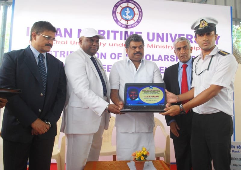 The Union Minister for Shipping, Shri G.K. Vasan distributing a Laptop to a Marine…