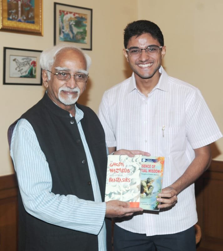 The Vice President, Shri Mohd. Hamid Ansari being presented the books…