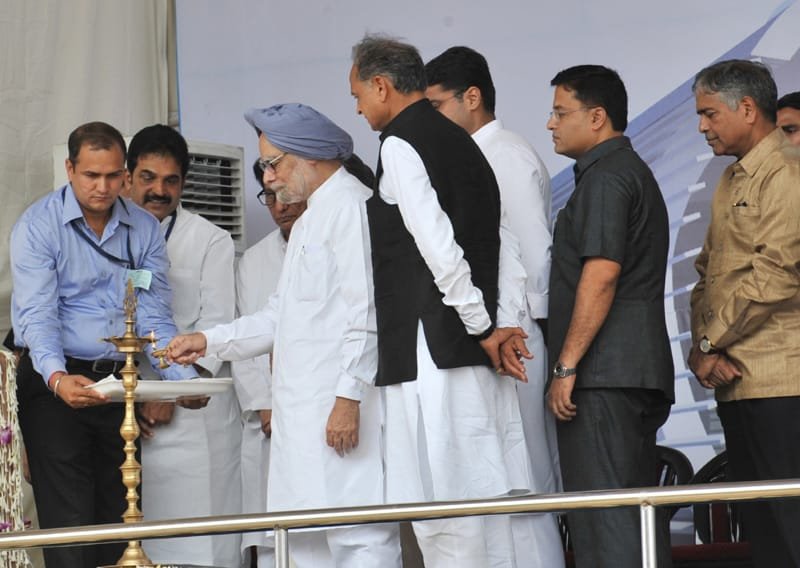 The Prime Minister, Dr. Manmohan Singh lighting the lamp at the foundation stone laying…