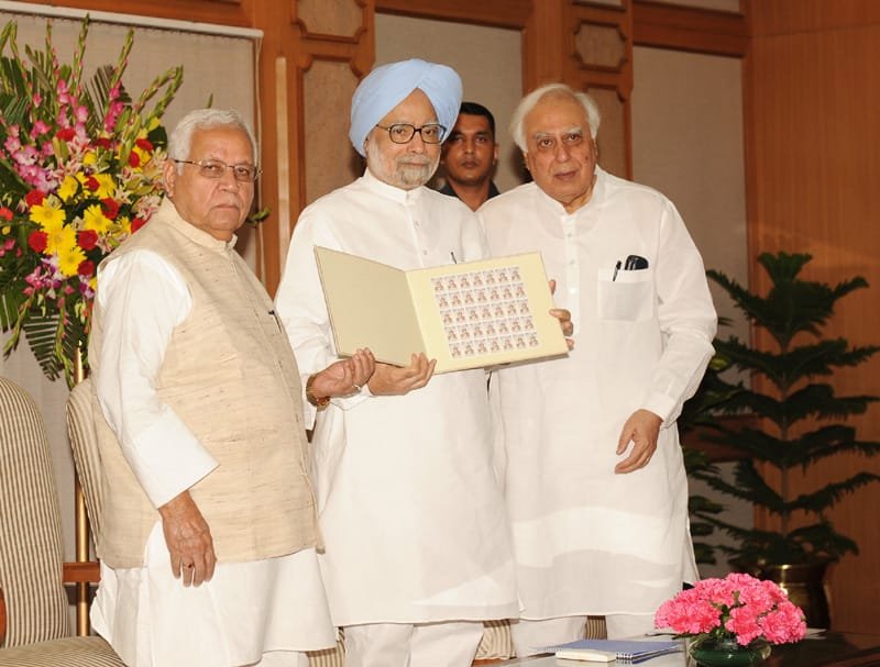 The Prime Minister, Dr. Manmohan Singh releasing the commemorative postage stamp…