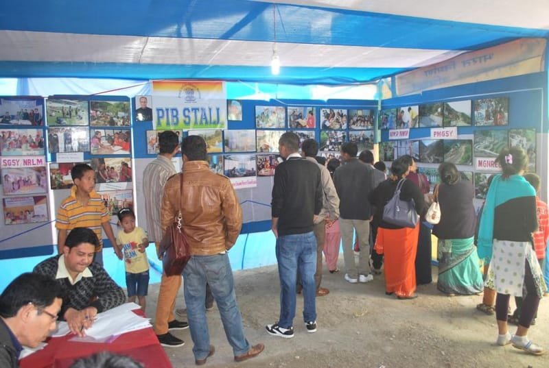 People visiting Bharat Nirman Stall put up by PIB, at the Bharat Nirman Public Information…
