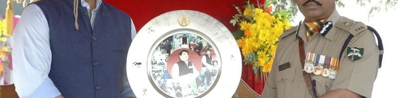 The DG (Addl.Charge), ADG ITBP, Dr. Mahboob Alam presenting a memento to...