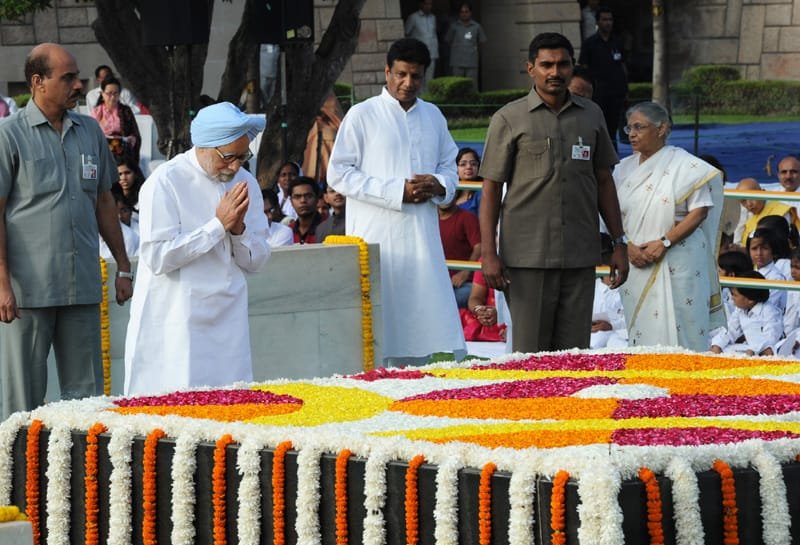 The Prime Minister, Dr. Manmohan Singh paying homage at the Samadhi of Mahatma…