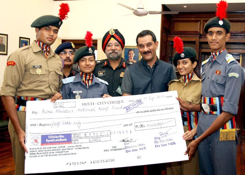 The NCC Cadets headed by the DG, NCC, Lt. General P.S Bhalla presenting a cheque of…