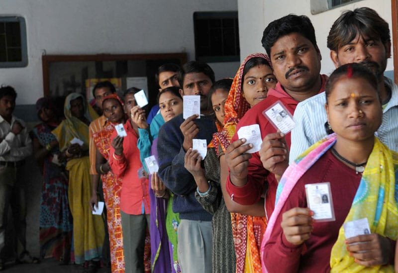 A large number of voters in a queue to cast their vote at a polling booth during the MP…