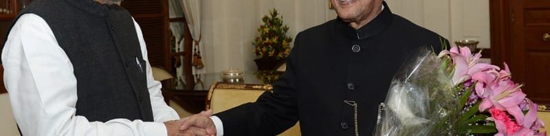 The Prime Minister, Dr. Manmohan Singh greeting the President,...