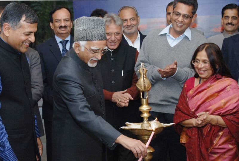 The Vice President, Shri Mohd. Hamid Ansari lighting the lamp to inaugurate…