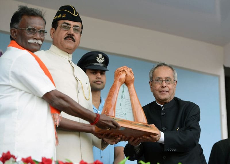 The President, Shri Pranab Mukherjee being presented a memento, at a…