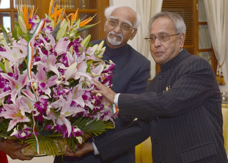 The Vice President, Shri Mohd. Hamid Ansari greeting the President,…