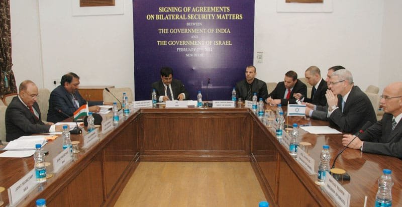 The Union Home Secretary, Shri Anil Goswami witnessing the signing of...