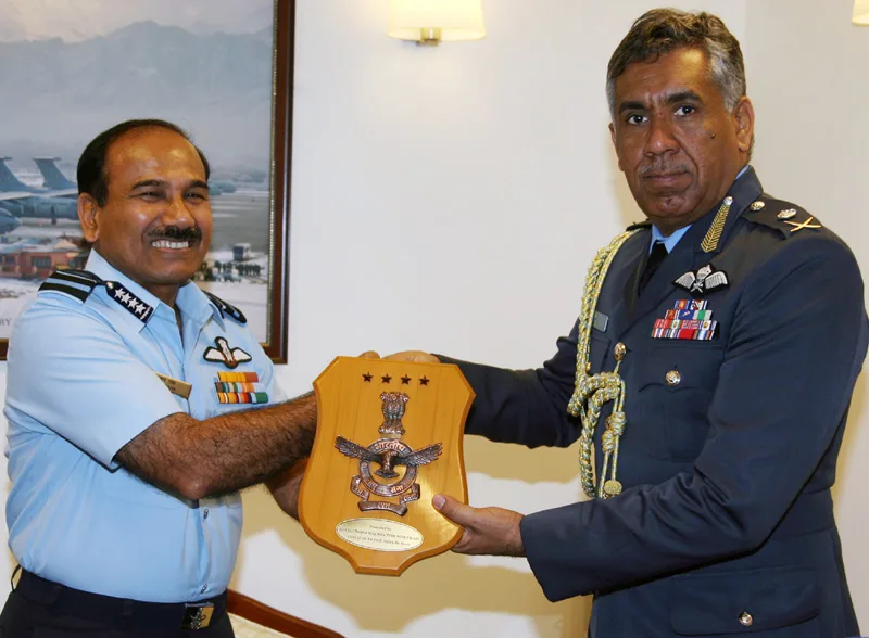 The Chief of the Air Staff, Air Chief Marshal Arup Raha presenting the…