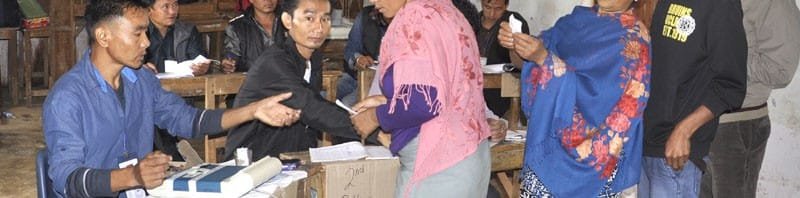 The voters at a polling booth to cast their votes for the General Elections-2014, ...
