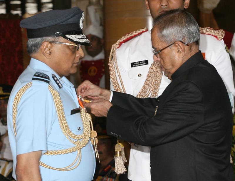 The President, Shri Pranab Mukherjee presenting the Param Vishisht Seva Medal..