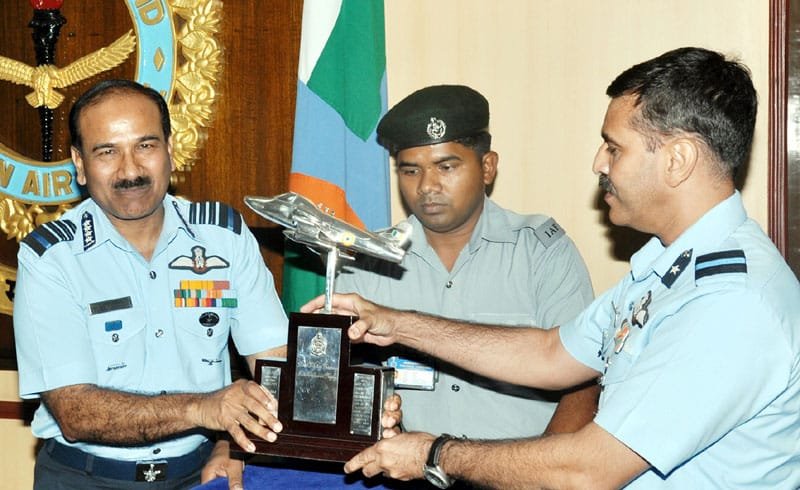The Chief of the Air Staff, Air Chief Marshal Arup Raha presenting the Best Flying..