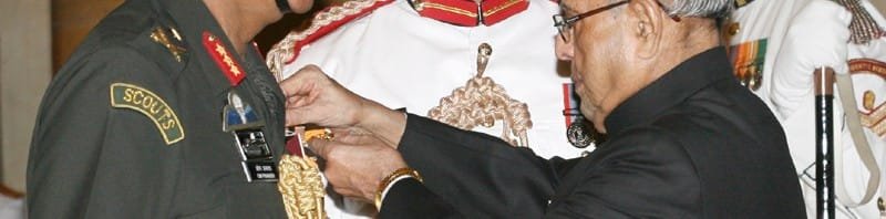 The President, Shri Pranab Mukherjee presenting the Uttam Yudh Seva Medal to..