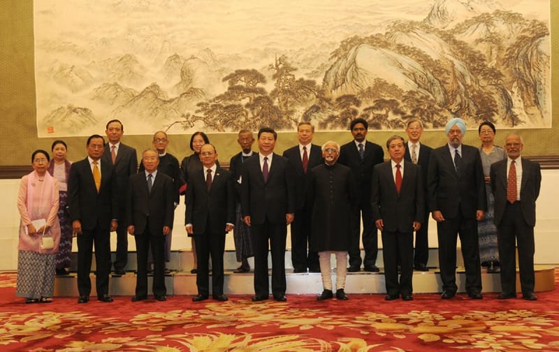 The Vice President, Shri Mohd. Hamid Ansari in a family group photograph before the Trilateral Summit Meeting 60th anniversary of pancheel, in Beijing, China