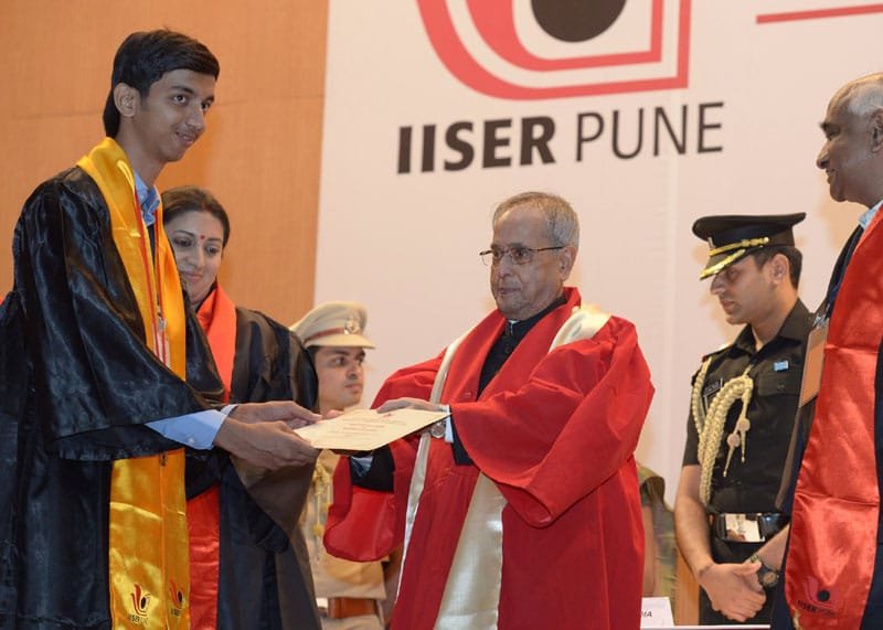 The President, Shri Pranab Mukherjee presenting the degree to a student, at…