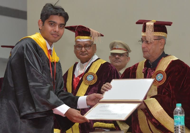 The President, Shri Pranab Mukherjee presenting the degree to a student, at…