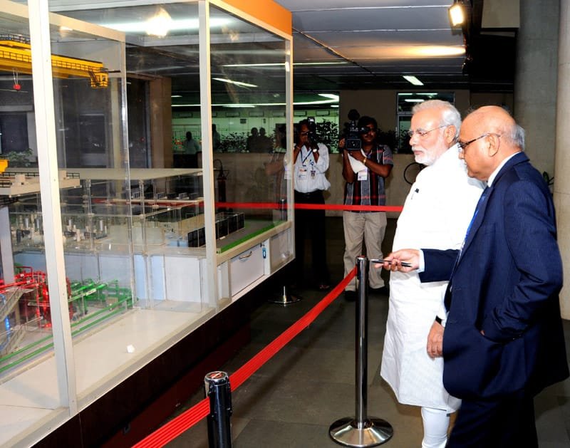 The Prime Minister, Shri Narendra Modi being briefed by the Secretary DAE and…