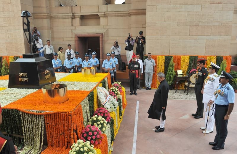 The President, Shri Pranab Mukherjee paying homage at the Amar Jawan Jyoti,…