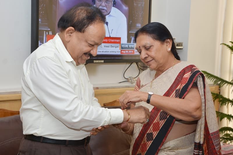 The Chief Minister of Gujarat, Smt. Anandiben Patel tying ‘Rakhi’ to …