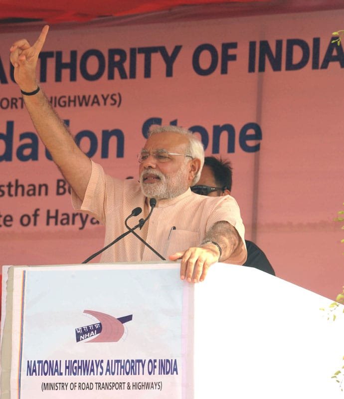 The Prime Minister, Shri Narendra Modi addressing after laying the foundation…