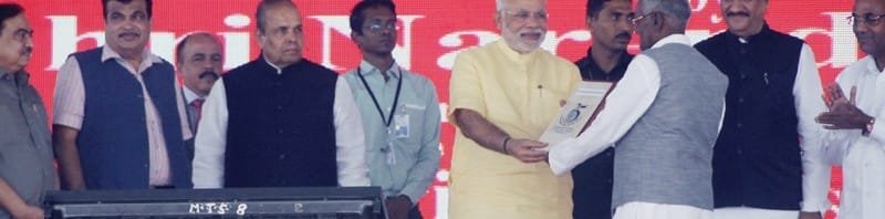 The Prime Minister, Shri Narendra Modi handed over land allotment letters to...