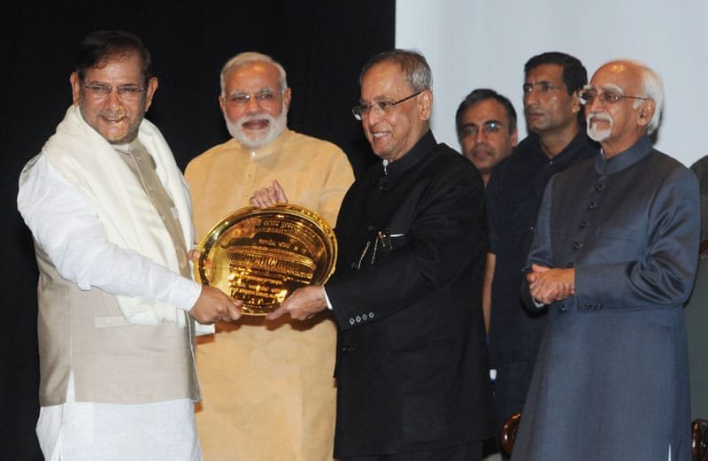The President, Shri Pranab Mukherjee presenting the Outstanding…