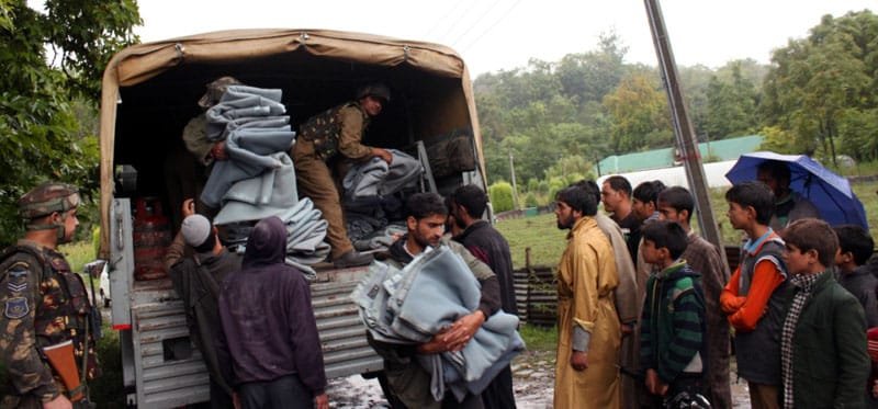 Relief materials (blankets) being distributed by Indian Air Force at Air Force…