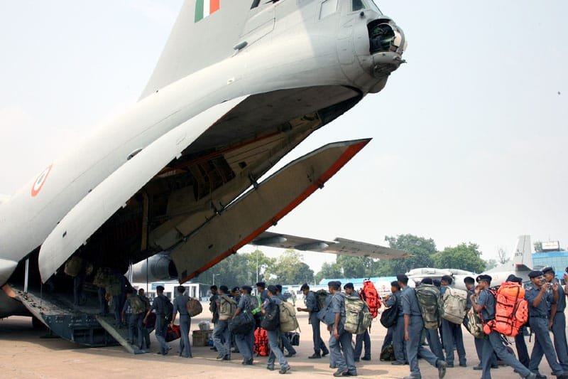 The National Disaster Response Force (NDRF) personnel boarding ...