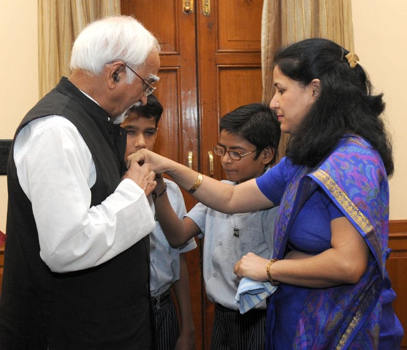 The Vice President, Shri Mohd. Hamid Ansari being pinned a flag by a delegation…