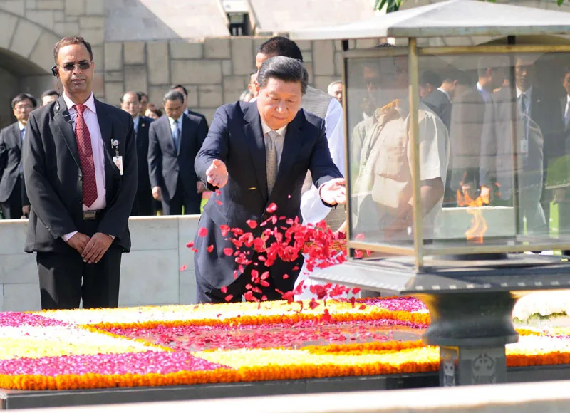 The Chinese President, Mr. Xi Jinping paying floral tributes at the Samadhi of …