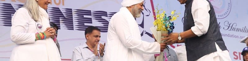 The Union Home Minister, Shri Rajnath Singh being presented a bouquet of ...