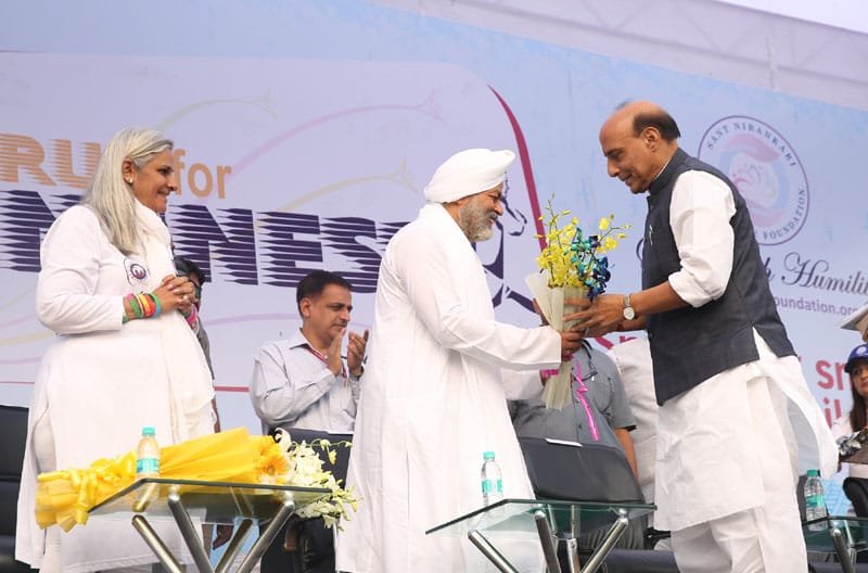 The Union Home Minister, Shri Rajnath Singh being presented a bouquet of …
