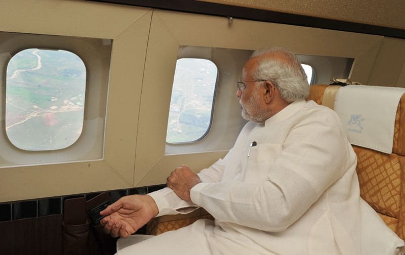 The Prime Minister, Shri Narendra Modi taking an aerial survey of cyclone...