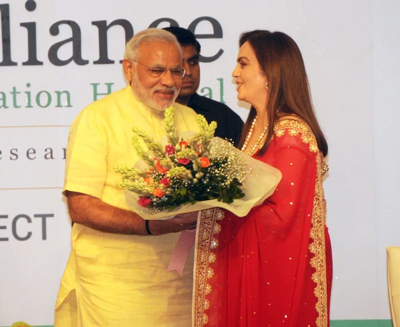 The Prime Minister, Shri Narendra Modi being presented a bouquet of flowers by…